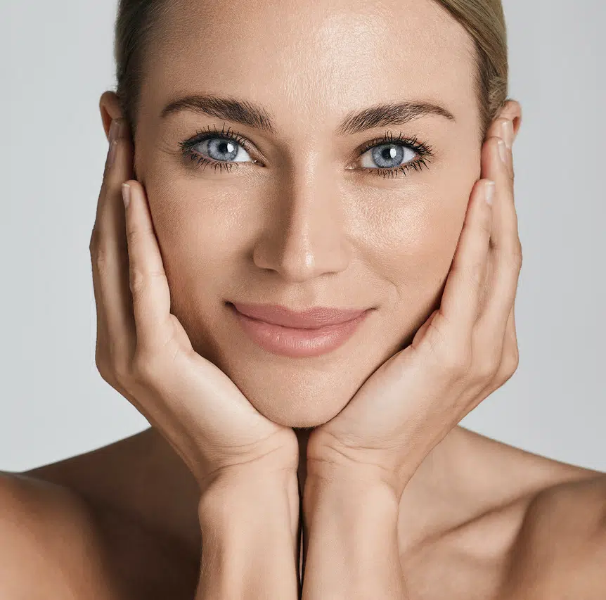 Photo of a woman with great skin after skin revitalization treatments
